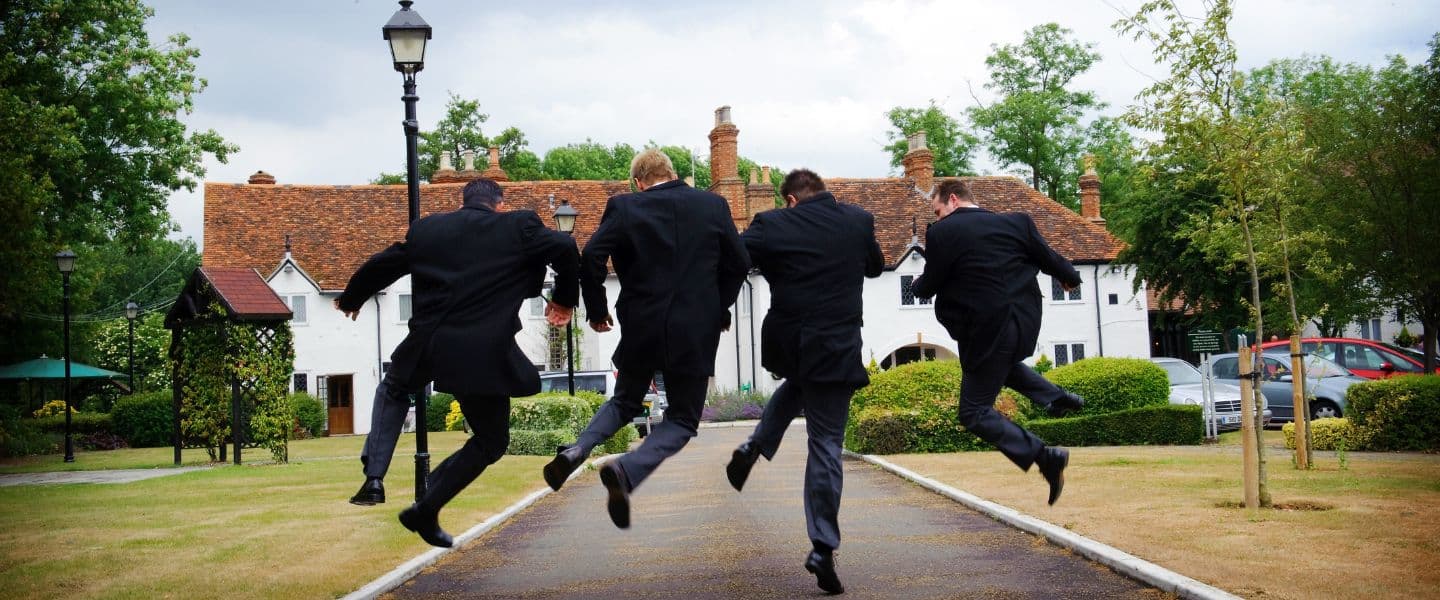 Groom & best-men jumping